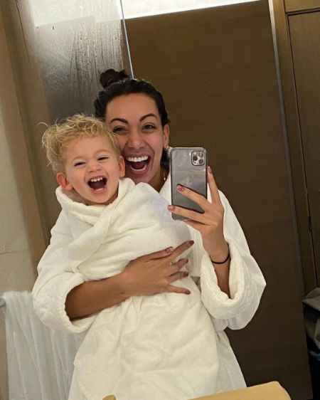 alexa de leon with her child beau reddick in a bathroom 