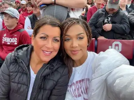 crymson rose with her mother lori love at nfl