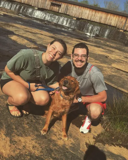 rodrigo blankenship and logan harrell with their dog in 2017