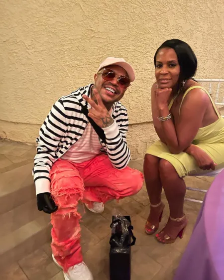 tonesa welch with dj paul during an event